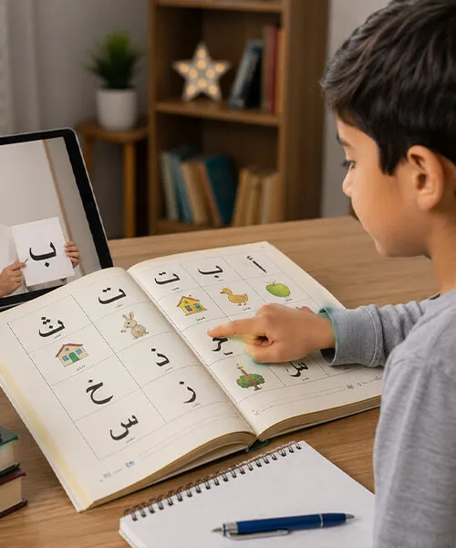 child reading arabic alphabet book